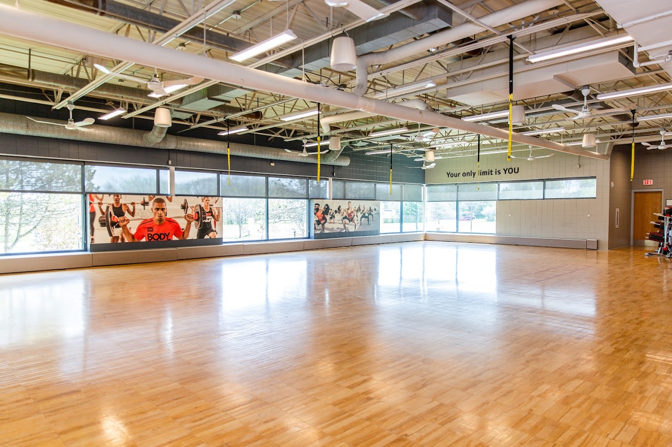 Southwest_Large Open Gymnasium with decorative images in the background